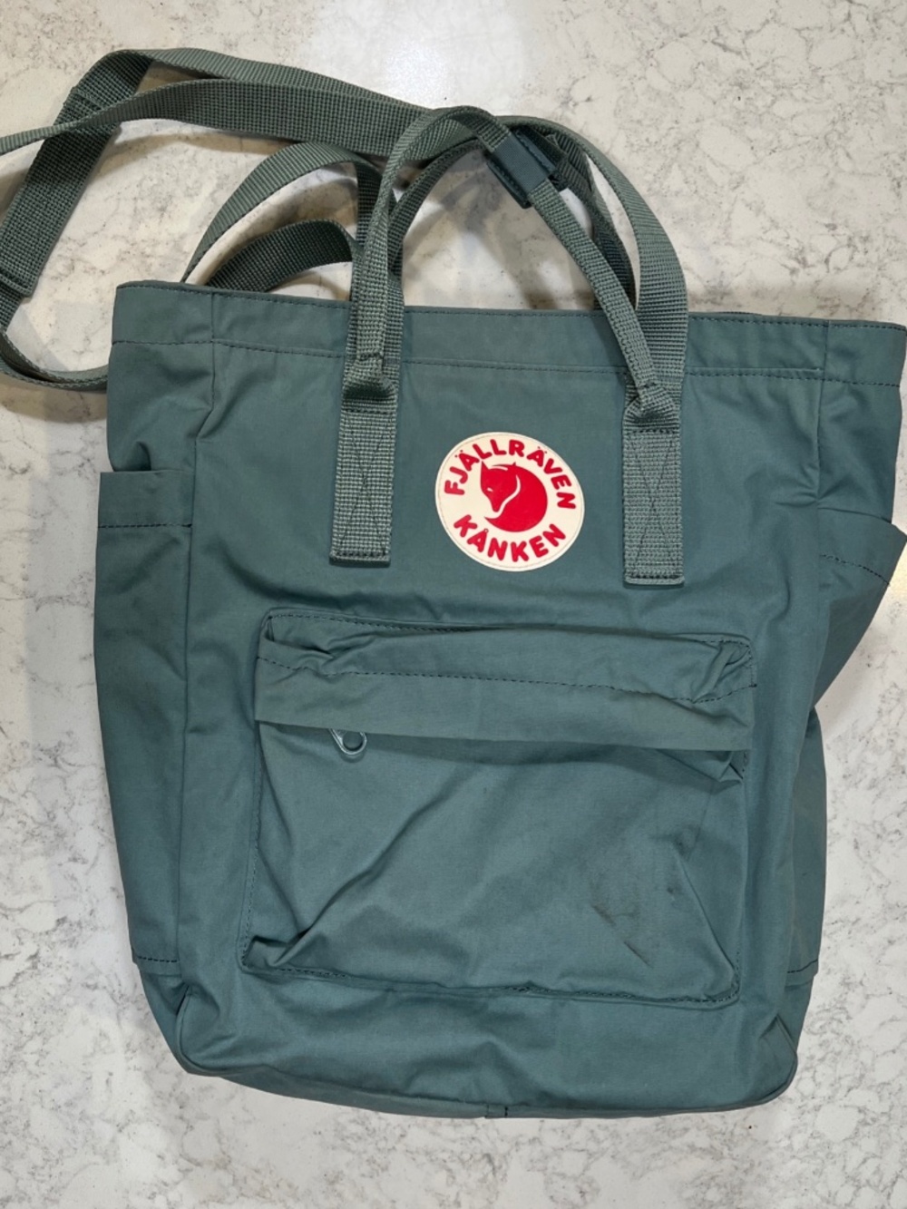 Fjallraven Kanken Backpack from Sweden Frost Green with accessories